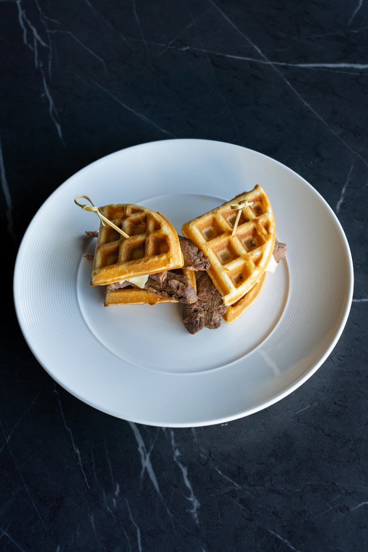 CoCreate CoBrew waffles and steak sandwich